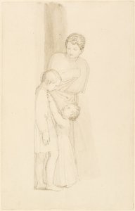 Une femme debout derrière un petit enfant